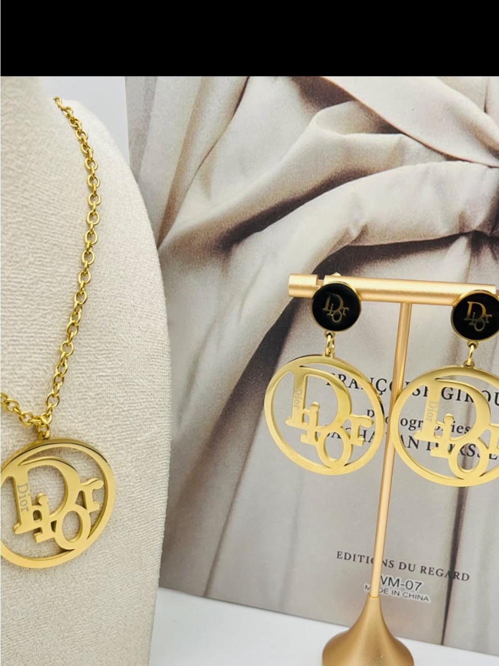 Dior Gold Tone Logo Drop Earrings with Black Accent